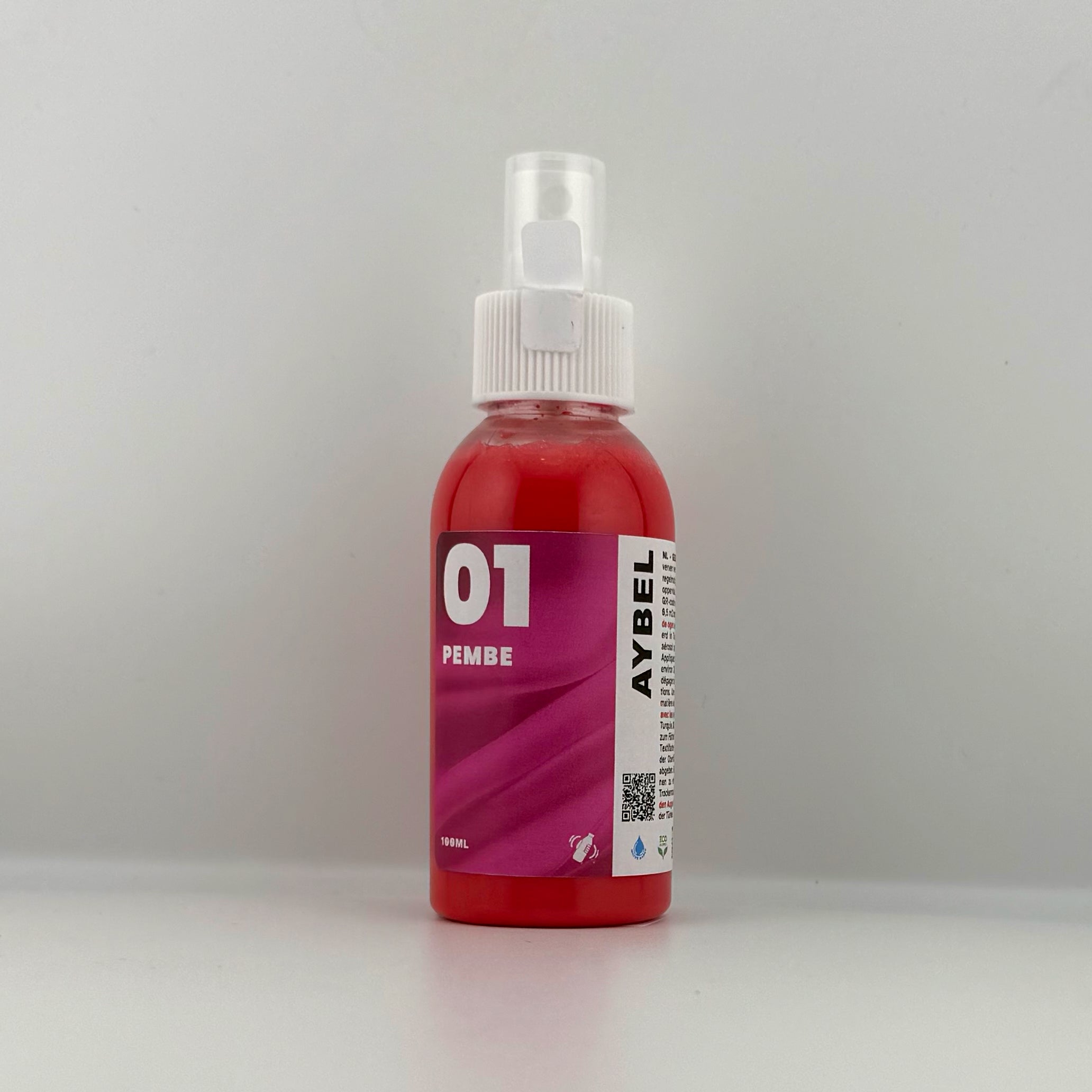 Tinte en aerosol rosa para telas