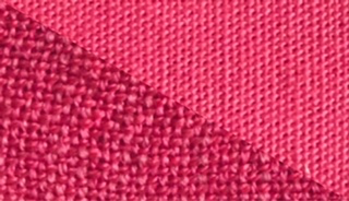 Fabric swatch dyed in cyclamen pink, demonstrating the vibrant color achieved with our dye on different fabrics